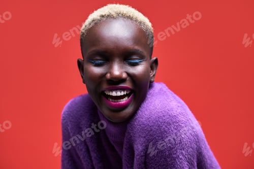 Preview: Happy African woman with short hair