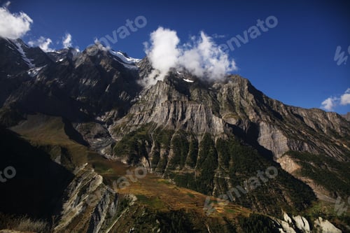 Preview: majestic landscape with rocky mountains and clouds in indian himalayas, keylong region