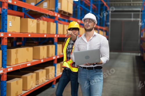 Preview: Supervisor and manager smiling happy holding laptop computer