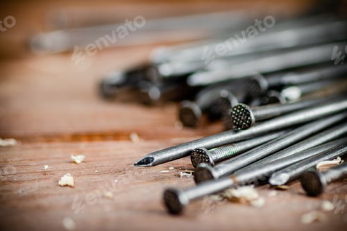 Preview: A bunch of nails on the table.