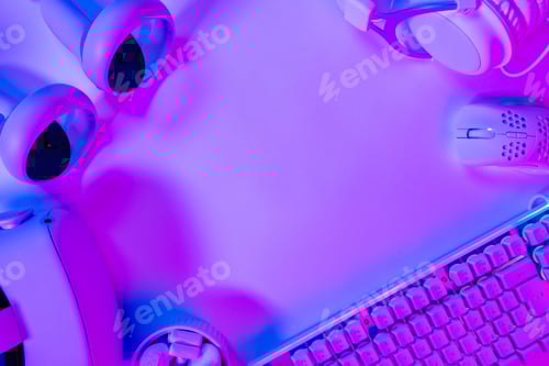 Preview: Various modern gaming accessories on purple desk