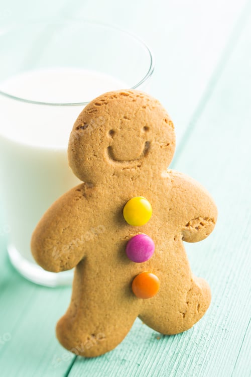 Preview: Sweet gingerbread man and glass of milk.