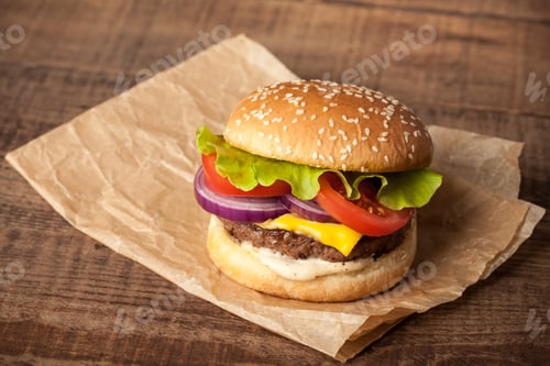 Preview: Fresh burger on wooden table