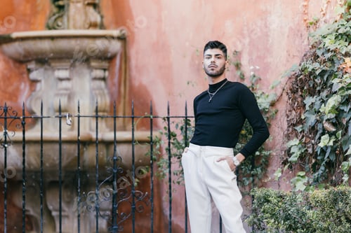 Preview: Portrait of a caucasian man in modern clothes standing outdoors