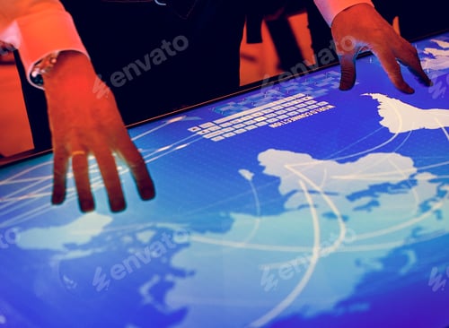 Preview: Hands touching a cyber space table screen