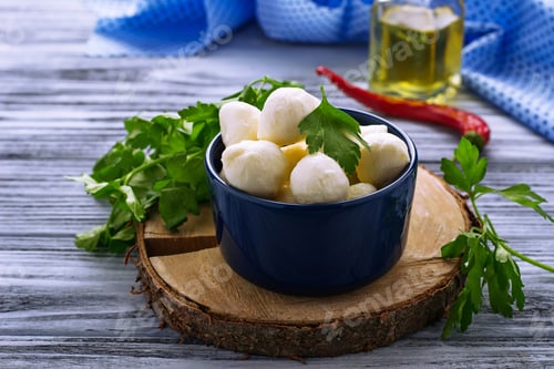 Preview: Italian cheese mozzarella in blue bowl
