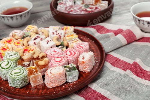Preview: Turkish delight on a wooden table.