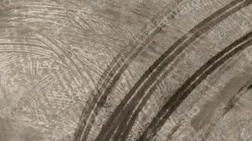 Preview: Aerial top view tire track on dirt sand mud, Texture of wet mud road with puddle