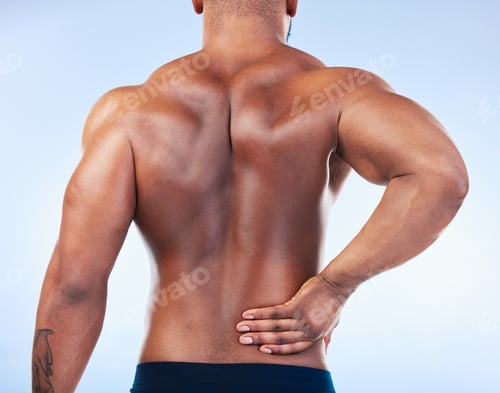 Preview: Black man, back pain and injury with fitness and health, medical problem and aching body in studio.