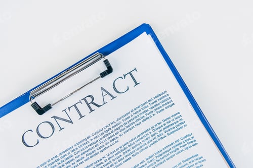 Preview: top view of clipboard with contract on white tabletop