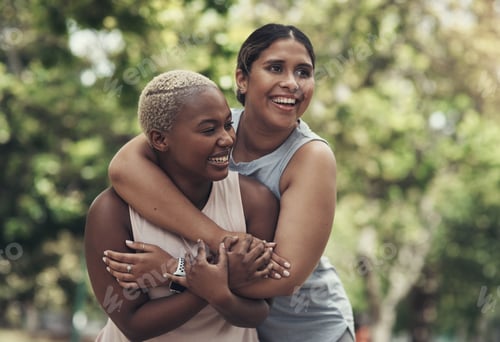 Preview: Feeling the love with my bestie. Shot of two female friends taking a break during their workout.