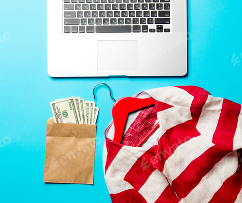 Preview: money, jacket, hanger and laptop