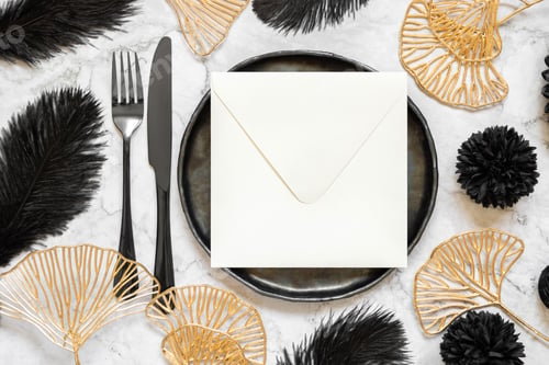 Preview: Black and golden wedding table setting with a blank square envelope top view, mockup