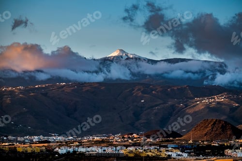 Preview: Beautiful landscape with city night lights and big vulcan