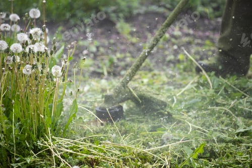 Preview: Lawn mover on green grass. Machine for cutting lawns.