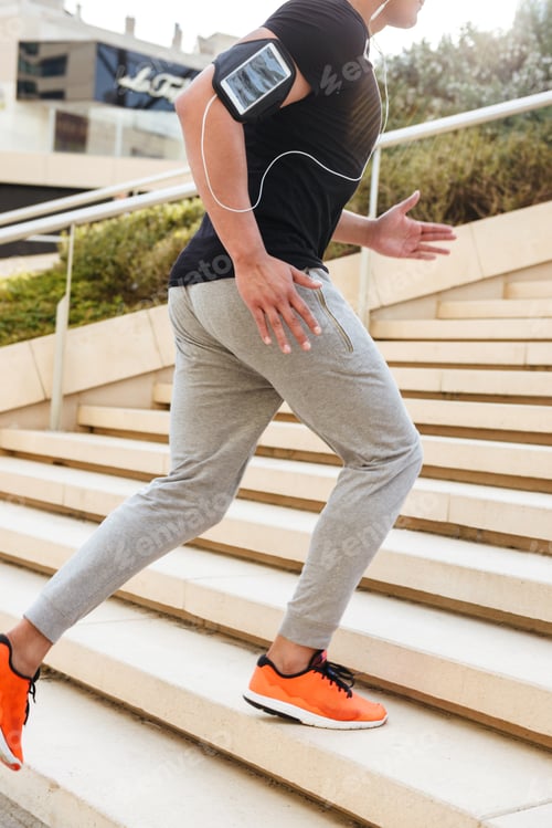 Preview: Cropped image of handsome young strong sports man