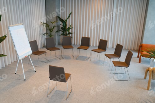 Preview: Empty meeting room chairs arranged for workshop or seminar