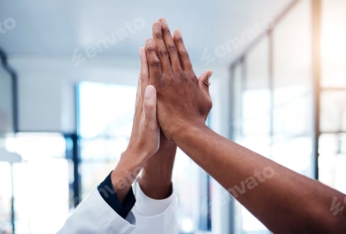 Preview: High five, success and doctors celebrating teamwork, medical collaboration and support in a hospita