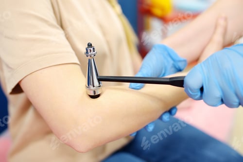 Preview: A woman at an appointment with a neurologist. A doctor examining young female patient.
