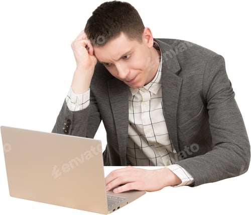 Preview: Confused Man Using Laptop in Gray Suit