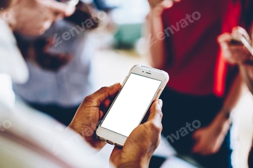 Preview: Ethnic person interacting with smartphone during meeting with friends on street