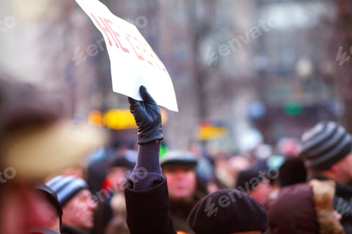 Preview: We stand united. Rear view shot of a group of protesters.