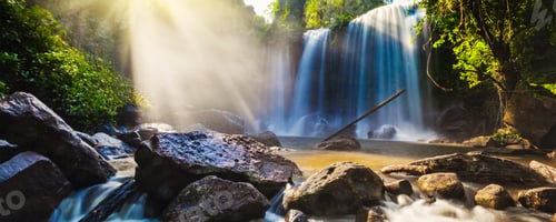 Preview: Tropical waterfall in jungle with sun rays