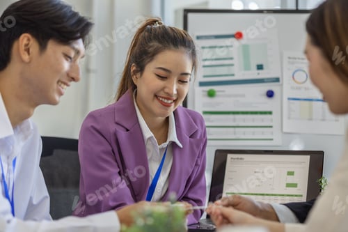 Preview: entrepreneurs brainstorm together to develop new products in a conference room