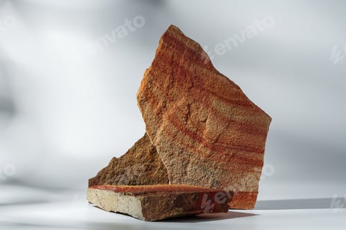 Preview: Piece of granite stone on white background with shadows