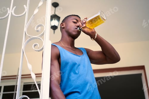 Preview: Lonely Unemployed Black Man Drinking Alcohol At Home