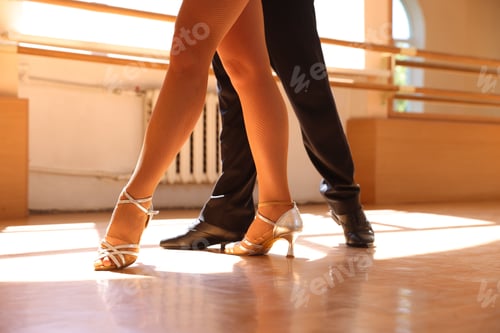Preview: Couple of professional dancers training in studio, closeup