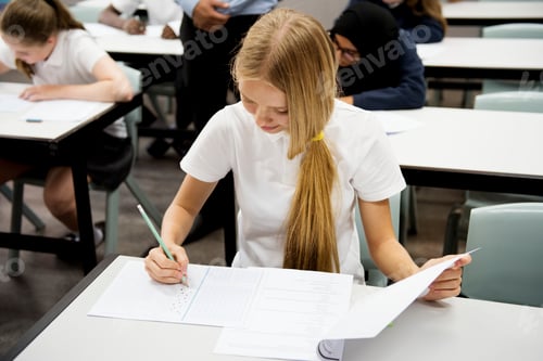 Preview: Students doing the exam in classroom