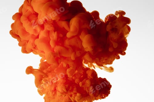 Preview: Close up view of orange watercolor splash isolated on white