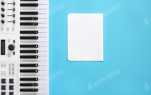 Preview: Musical keys and a blank sheet of paper on a blue background.