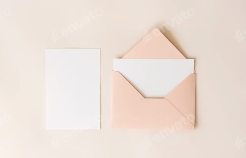 Preview: Mockup blank letter inside pink envelope and white paper on beige background