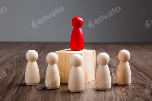 Preview: Wooden people figures on wooden background. Career growth, development and leadership