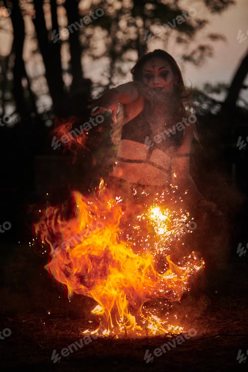 Preview: Girl fire dancing performance at outdoor art festival, smooth movements of female artist