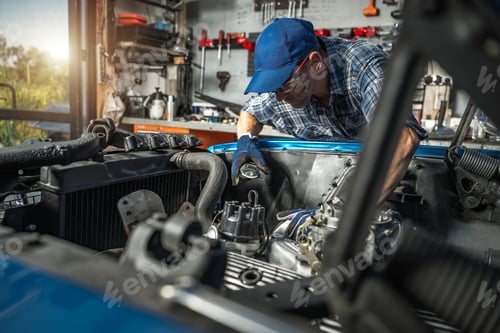 Preview: Car Mechanic Taking Care of the Restoration Project