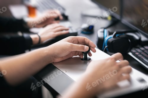 Preview: A man operating a fighting stick in a fighting game