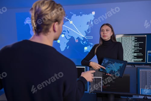 Preview: Professionals collaboratively analyzing real-time data in a cyber security operations center