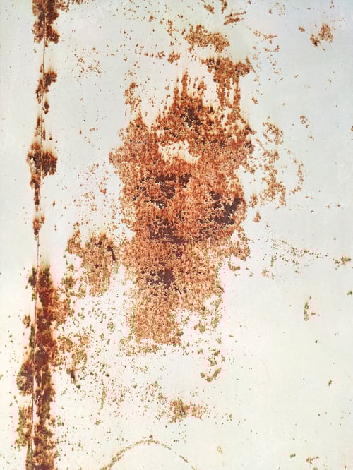 Preview: Rusty metal background with streaks of rust. Corroded metal background. Rust stains. Rusty corrosion