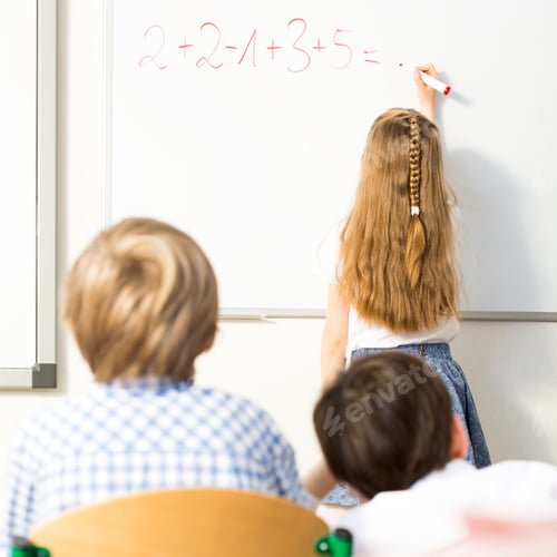 Preview: Girl writing on board during lesson