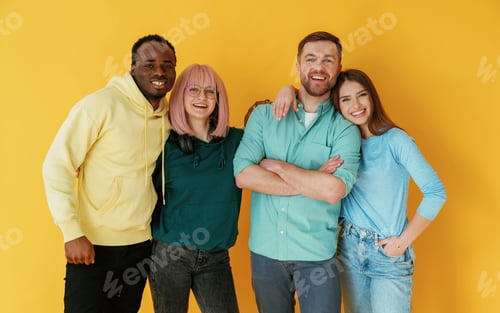 Preview: Front view. Group of friends are in the studio against background