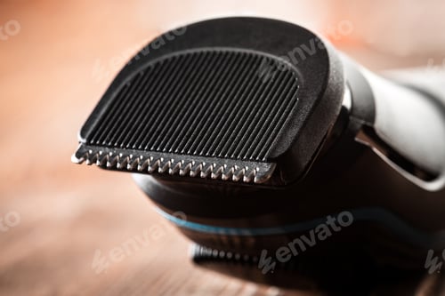 Preview: Hair Trimmer And Scissors On The Wooden Background. Beard And Hair Clippers.