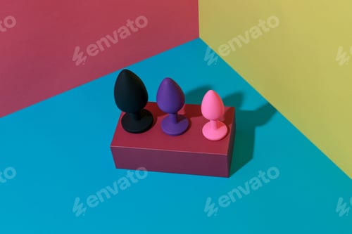 Preview: Different colored buttplug sex toys with contrast shadows. Anal toys for adult. Sex shop concept