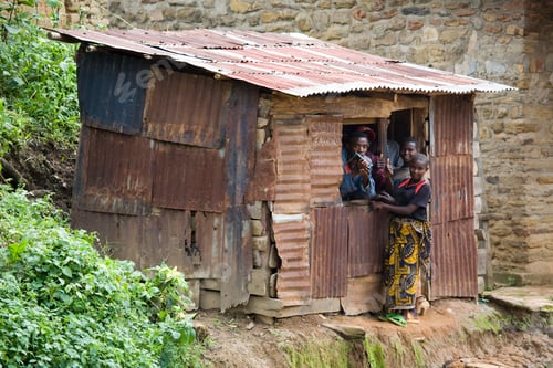 Preview: Family gathering at a rustic abode.