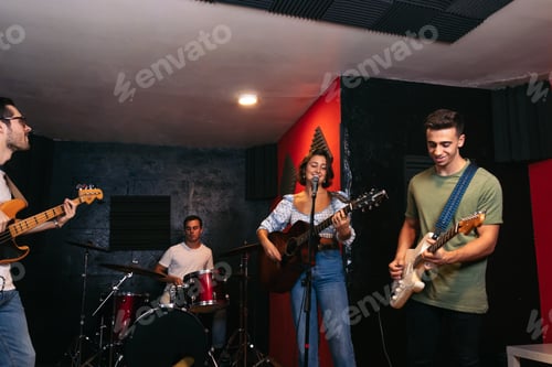 Preview: Music band rehearsing in a music venue