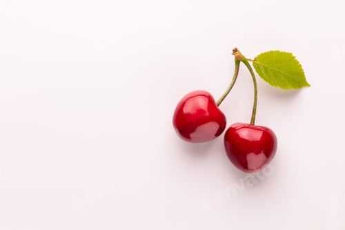 Preview: Cherry berries on a pastel background top view. Background with a cherry on a sprig, flat lay