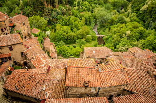 Preview: View of a green valley in Sorano over red roofs, Italy
