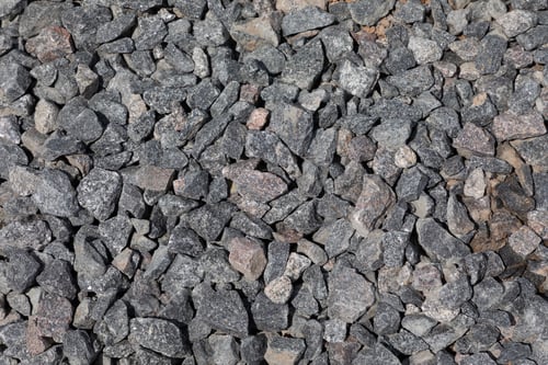 Preview: crushed stone evenly distributed on the ground, top view